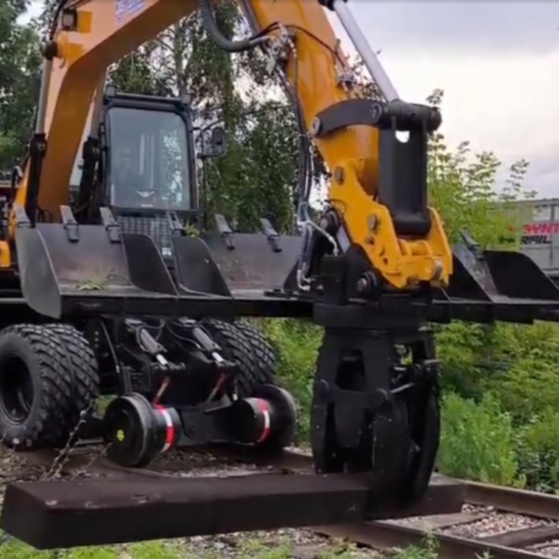 Construction efficace : Machine de changement de traverses de chemin de fer JG80ST, directement sur le chantier.